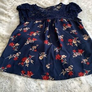 Cute blue top with floral pattern